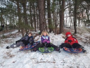 They had a great time going up and down the hills. This was a nice opportunity for the kids to get out and play during winter.
