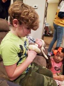 Santino's birthday party - Jarek holding a snake