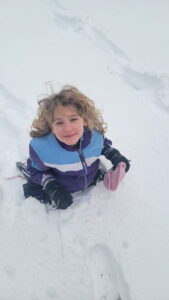 Arya enjoying playing in the fresh snow at our home in New Jersey. 