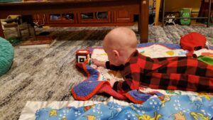 Garrett at six months. He continues to explore and grow. 