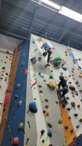 Undaunted, Evan moved on to the harder wall and made it to the top!