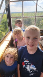 The kids made it to the top! It is a bit crowded up there with all the kids, and not very big to start, but it does offer quite the view. 