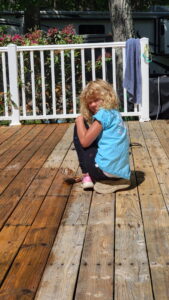 Alan took advantage of a free day to start restaining the deck. Arya helped Alan a bit painting the stain on the deck. 
