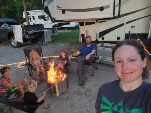 Family time around our Hot Shot fire pit and roasting marshmallows and hot dogs!