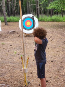 Jarek takes aim at the archery range. 