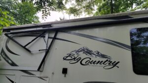 I'd love to say that the trip started off smoothly, but it didn't. We got off to a late start, much later than we wanted to. We arrived at the campground outside of Gettysburg, PA late at night and made a wrong turn, not realizing where we were supposed to go. This resulted in us taking the RV through some places that weren't meant for it, and we contacted a tree and drug the awning a bit. Fortunately, it was not catastrophic damage and we were able to continue the trip, although we ended up loosing the awning for the trip. As you can see in this picture, we were unable to open one of our slides to the bedroom until it was removed. We employed a local mobile RV repair and made temporary repairs and continued on with the trip. 