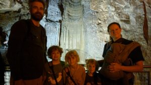 Family shot in front of one of the waterfall formations. 