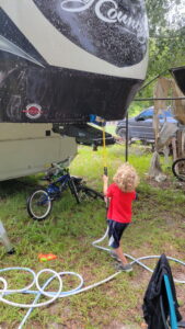 A little more RV maintenance. Washing the RV and cleaning off the mildew and dirt from the last few years. Evan got into it and helped out. 