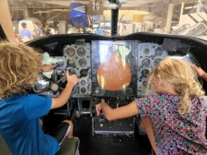 Team work time! Jarek and Arya at the controls of a E-2 Hawkeye. 