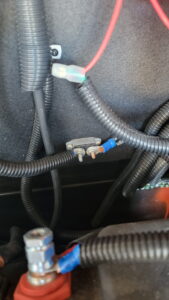 The offending circuit breaker. Once we got to the RV park outside Round Rock/Austin, TX, I found this to be the issue. The breaker was not allowing full voltage to pass through and charge the batteries. I ordered a new breaker and had it shipped to the RV park and installed it, and all was good again. 