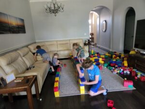 We made it to Uncle Brian's and the kids had a blast. Uncle Brian had some over sized lego blocks, and the kids and their cousin, Uncle David, got right to work building a fort. 