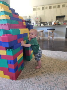 Garrett is inspecting the building for durability. He found that it was quite destructable. 