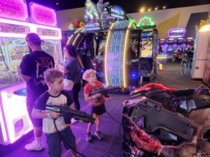 Evan and David having fun in a shoot em up game. 