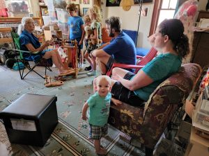 Our first stop was a spinning demonstration. They kids were very interested in learning how to make thread and yarns from animal fiber. 