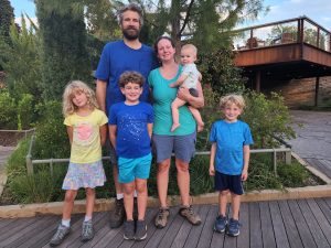Family picture at The Gathering Place. This was near a koi pond and the kids had a great time feeding the fish some bread. 