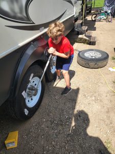 Jarek helping me torque the lugnuts with the new wheels. 