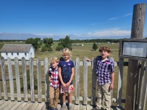 Jarek, Arya, Evan at the top of the observation tower at the homestead site. 