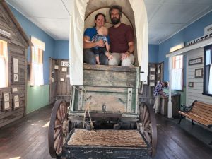 Ma and Pa in the wagon with Garrett ready for the trip!
