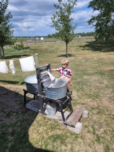 Evan takes a turn at doing some laundry. 