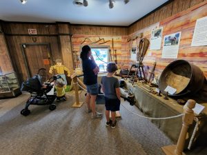 Meagan and Jarek checking out the pioneer life display. 
