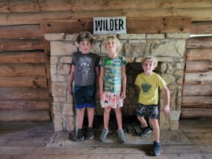 Kids in front of the Wilder fireplace. 