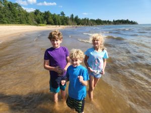 The kids were excited to stop and play in the waters of Lake Michigan!