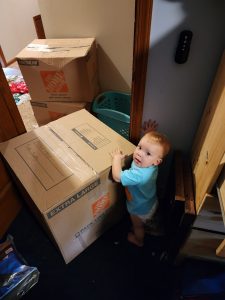Shortly after returning from our trip, efforts to begin packing and vacating the house in preparation for sale. Garrett wanted to make sure all the boxes were packed properly. 