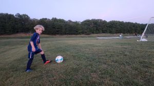 Evan on the field during a soccer game. 