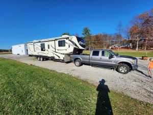 All fixed up with the new awning installed and side wall damage repaired from the earlier tree incident. 
