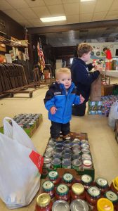 Garrett helps out during the Cub Scout food drive, Scouting for Food. We were sorting all of the collected food items into their various groups and checking for expired items. 