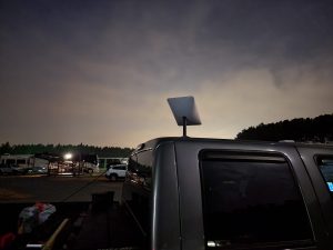 Playing with the Starlink Antenna. Alan placed it on top of the truck to get a good view of the sky. The Starlink internet service would become highly valued as we visited many RV parks with poor cell service and poor or no wifi. 