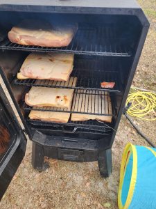 Time for another batch of bacon. Alan has 25 lbs of bacon in the smoker for final processing. 